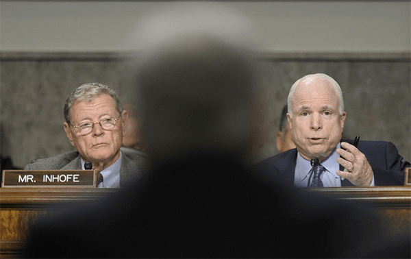 Senator James Inhofe, left, and Senator John McCain, right, of the Senate Armed Services Committee. (AP Photo/Susan Walsh)