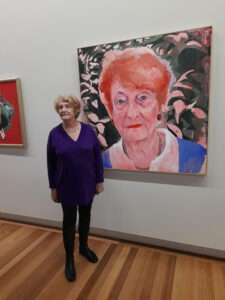 Dr. Caldicott with her portrait